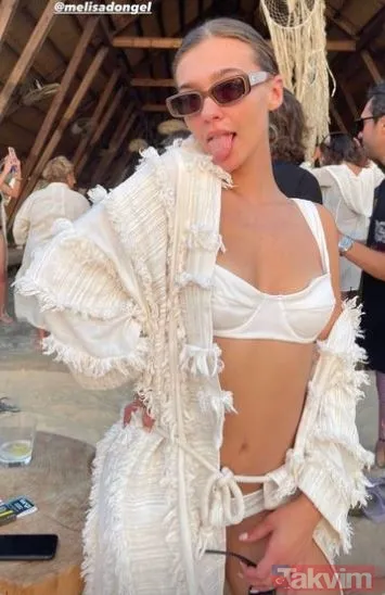 Melisa Döngel’den cüretkar paylaşımlar! Önce plajı podyuma çevirdi poz verdi sonra beyaz bikinisiyle dans etti sosyal medya sallandı - 10