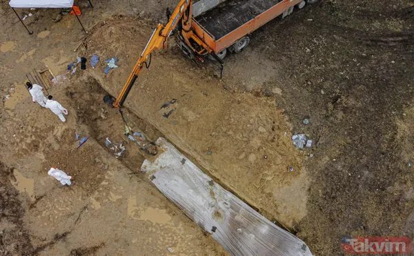 Ceset war! Buça'da dehşete düşüren görüntüler! Toplu mezarlar... - 27