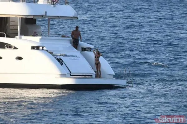 Ebru Şallı ve eşi Uğur Akkuş teknede aşka geldi birbirlerine öpücükler kondurdular! Tatil bahane romantizm şahane - 11