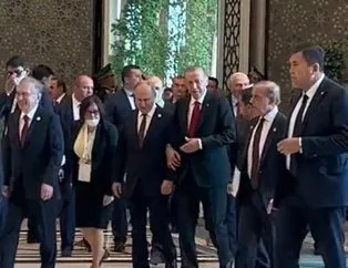 Başkan Erdoğan ve Putin’den kol kola diploması
