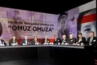 Omuz omuza yürek yüreğe
