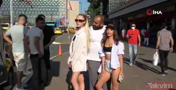 Yabancı uyruklu iki kadın Taksim Meydanı'nı podyum gibi kullanıp poz verdi - 7