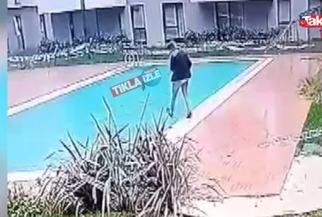 Havuza düşen kurye kamerada!