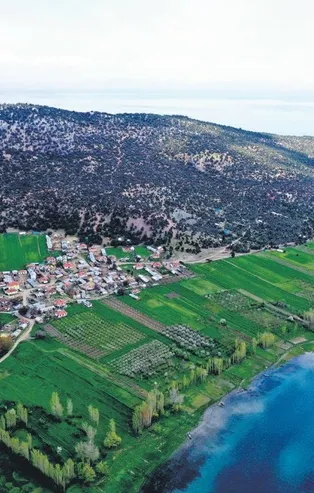 Gölün ortasındaki adada koronavirüsten izole bir hayat sürdürüyorlar