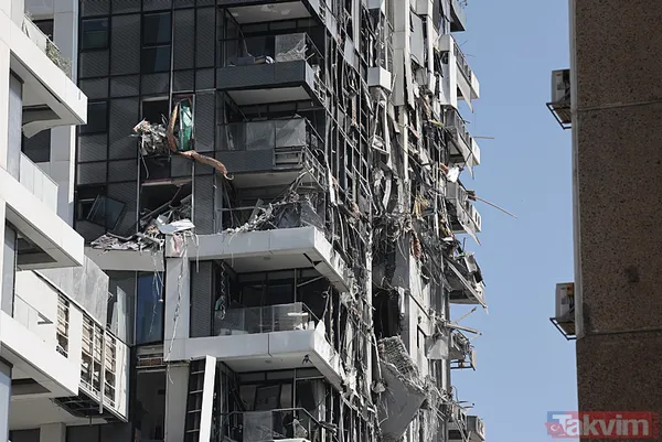 İran'dan İsrail'e misilleme! Füzeler yağdı binalar yıkıldı | İşte yıkımdan kareler - 26