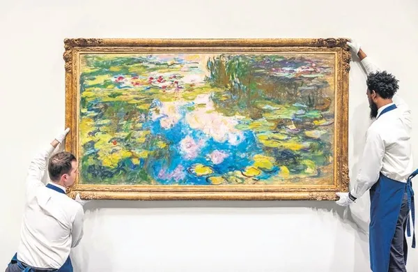 Pablo Picasso'nun 'Pencerenin Yanında Oturan Kadın'ı 103 milyon dolara satıldı-1