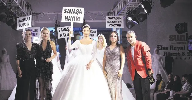 Barış için podyuma çıktılar: Mankenlerden savaşa hayır pankartlı tepki!