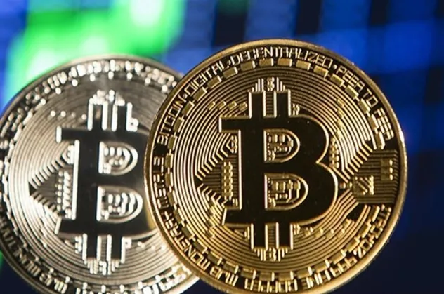 Bitcoin 18,000 doların üzerinde tutunuyor
