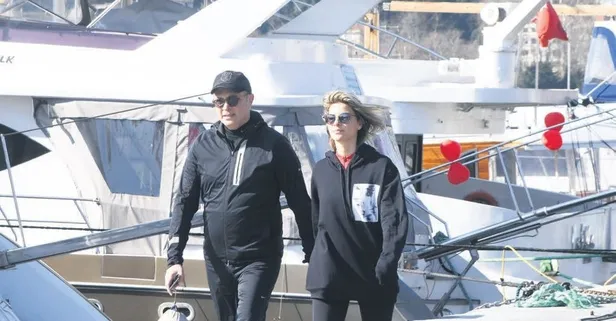 Fikret Orman sevgilisi Tuğba Coşkun ile Bebek sahilinde yürüyüş yaptı