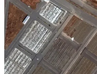 İran'ın Kum şehrinden korkutan kareler! Koronavirüs mezarları uydu görüntüsüne yansıdı