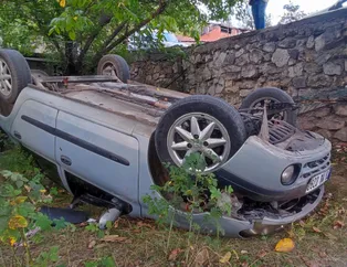Otomobil bahçeye düştü