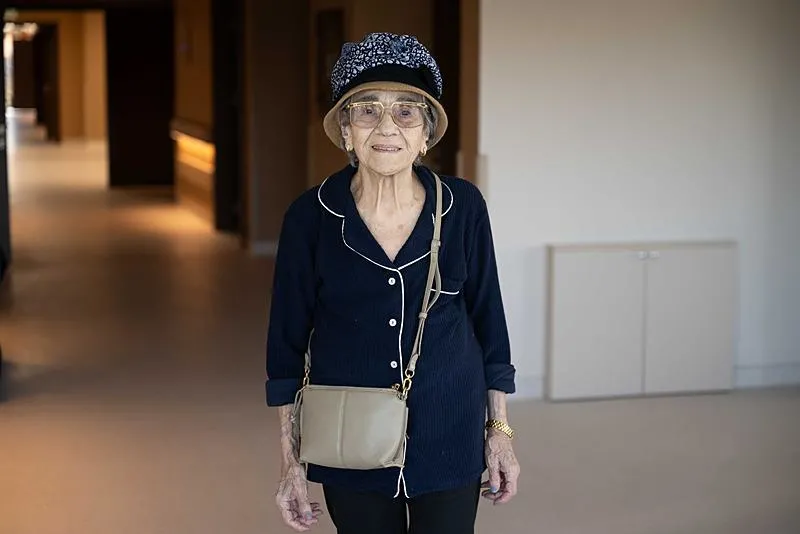 Başkan Erdoğan'ın Darülaceze ziyaretinde ʺKimsem yok.ʺ demesi üzerine ʺBiz varız.ʺ diyerek karşılık verdiği Suzan Tosun AA muhabirine konuştu. (AA)