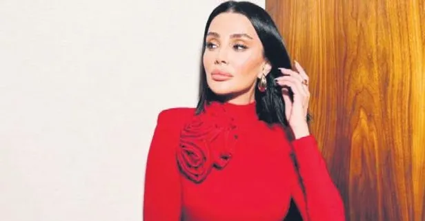 Özge Ulusoy’un kırmızı elbisesiyle verdiği pozlar beğeni yağmuruna tutuldu!
