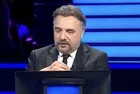 1991 yılından beri kırılamayan Mike Powell'a ait "uzun atlama" dünya rekoru kaç metredir?