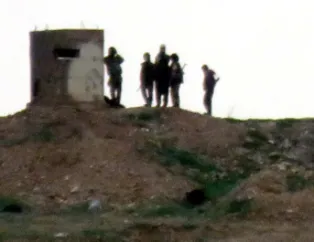 Silahlı teröristler mevzilerinde ilk kez görüldü