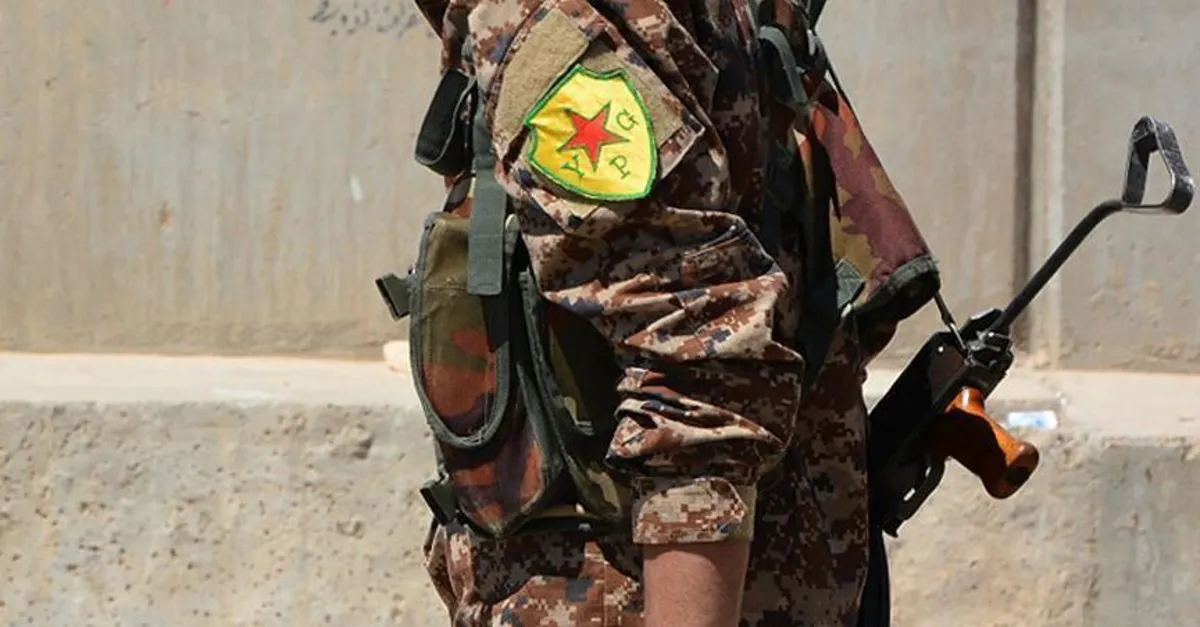 YPG’li teröristlerin üniforma oyunu!