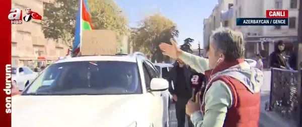 azerbaycanin-sevinc-kutlamasinda-dikkat-ceken-pankart-milli-kahraman-selcuk-bayraktar-1605009703923.jpg