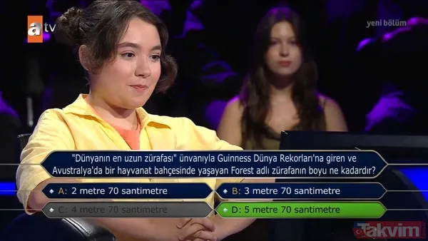 "Kim Milyoner Olmak İster?"de heyecan dolu anlar: Yarışmacı iki şık arasında kaldı! O soruda risk aldı mı? - 12