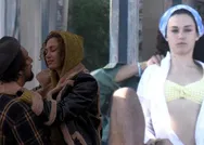 Melisa Şenolsun sevgilisini öpücüklere boğdu Umut Evirgen ise masaj yaptı! İşte plajda aşka gelen çiftin Bodrum kaçamağı...