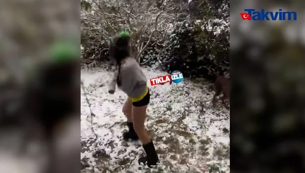 Neslihan Atagül dondurucu soğukta mini şortuyla poz verdi