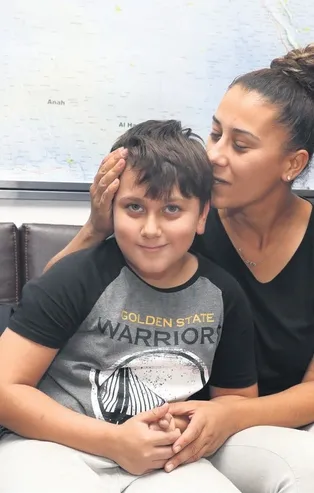 Kaçırılan oğluna Erbil'de kavuştu