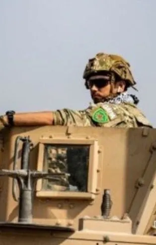 ABD askerleri YPG arması taktı