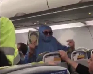 Uçakta Ben FETÖcüyüm, uçağı patlatacağım diye bağıran kadının polis oğlu da tanıdık çıktı