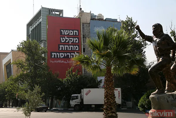 İran-İsrail arasın misilleme savaşı! Tahran sokaklarında “intikam” afişleri - 1