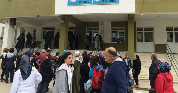 Polis memuru veli okulda dehşet saçtı