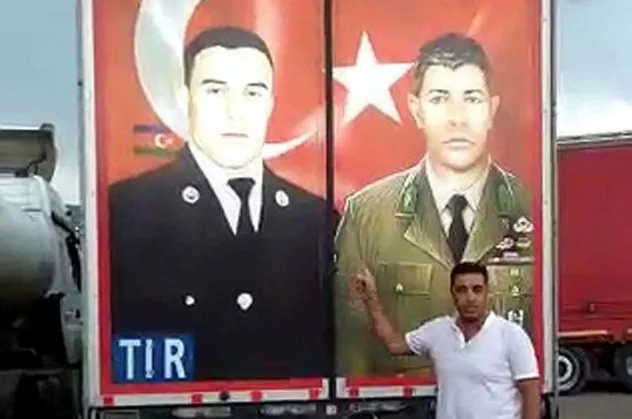 Gürcistan polisine direnen Türk şoför, TIR'daki milli kahramanların fotoğrafını söktürmedi!