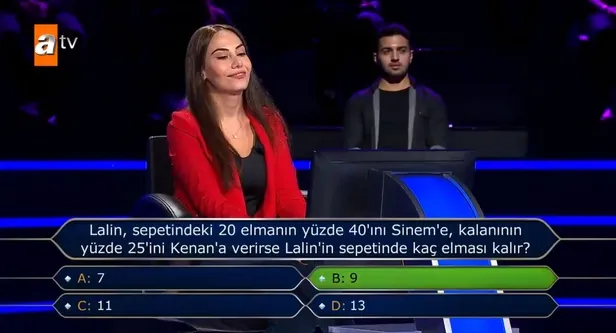 kim-milyoner-olmak-isterde-gulumseten-anlar-kenan-imirzalioglu-esi-sinem-kobal-ve-kizi-lalinin-ismini-duyunca-bakin-neler-oldu-1609021609042.jpg