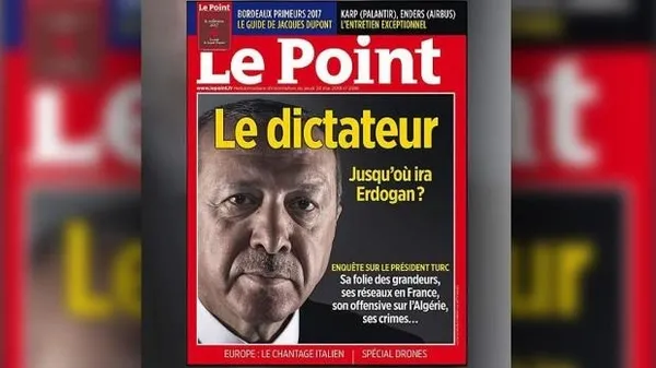 Fransa'daki Türkler Erdoğan'a hakaret eden derginin afişlerini indirdi-1