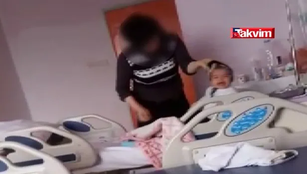 Hasta bebeğini ağladığı için döverken görüntülendi, gözaltına alındı