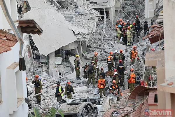 İran'dan İsrail'e misilleme! Füzeler yağdı binalar yıkıldı | İşte yıkımdan kareler - 33