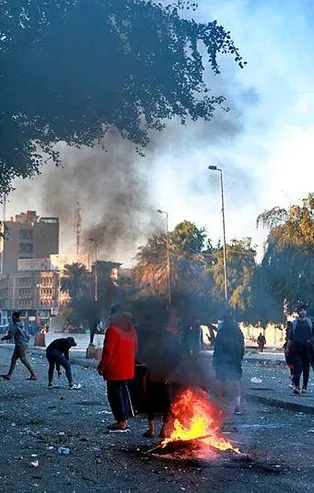 Son dakika: Bağdat'ta iki gösterici gerçek mermiyle öldürüldü