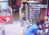 Şişli'de silahlı market soygunu kamerada