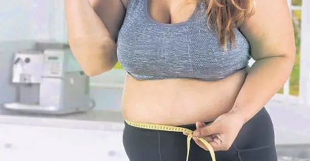 Fazla kilo belimize yük | Obezite ve kas zayıflığı bel ağrısına yol açıyor