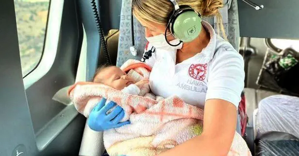 Sağlık Bakanı Fahrettin Koca'nın bebeği kucağında taşırken çekilen fotoğrafını paylaştığı Acil Tıp Teknisyeni Öznur Korkmaz konuştu