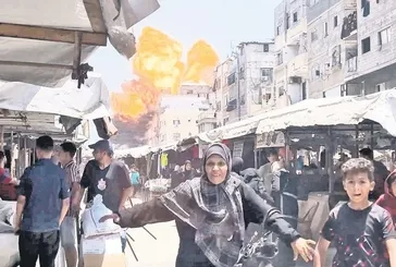 Yardım bekleyenlere tank ateşi