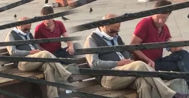 Kadıköy’de bir şahıs bankta uyuyan kişinin cüzdanını çalmak isterken kameralara yakalandı