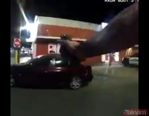 ABD'de polis sürücü koltuğundan inmeyen genci silahla vurarak yaraladı - 6