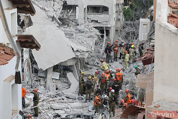 İran'dan İsrail'e misilleme! Füzeler yağdı binalar yıkıldı | İşte yıkımdan kareler - 35