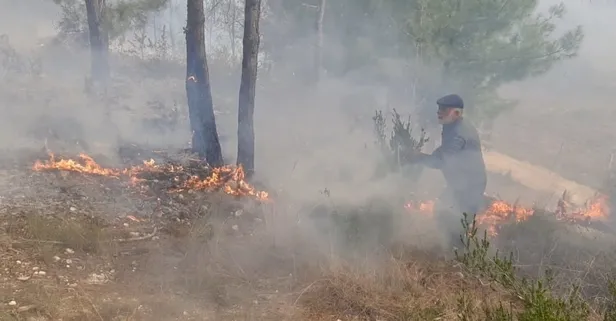 Osmaniye’de tuhaf olay... Çıkardığı orman yangınını çalıyla söndürmeye çalıştı