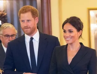 İngiliz kraliyet ailesinin yeni üyesi Meghan Markle mini elbisesiyle davete gitti...