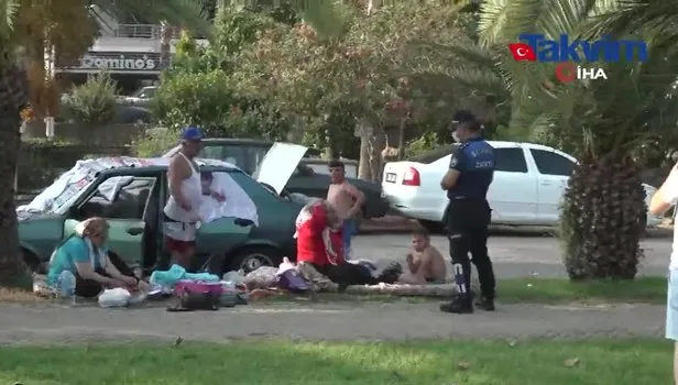 Antalya’da zabıta ekipleri park ve refüjlerde tatil yapanları uyardı! Uymayanlara ceza yazdı