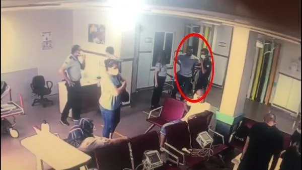 Hastanede panik anları kamerada! Yardım istediği polisin tabancasını alıp kaçmaya çalıştı-2