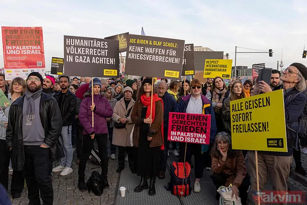 İşgaçi İsrail'in destekçi Joe Biden'a Berlin'de tepki yağdı: Bu senin soykırımın, ABD 1 numaralı terörist... - 7