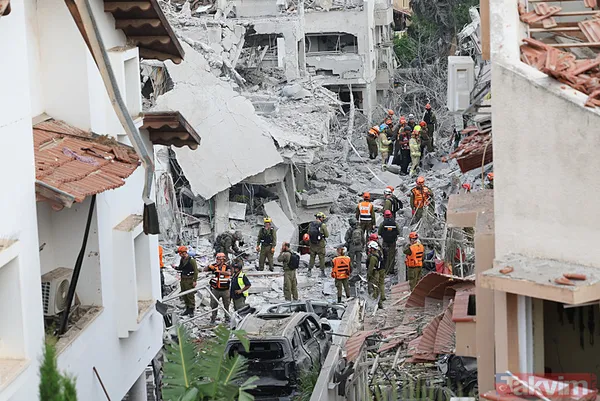 İran'dan İsrail'e misilleme! Füzeler yağdı binalar yıkıldı | İşte yıkımdan kareler - 7