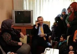 Başbakan Erdoğan'dan ev ziyareti
