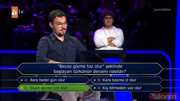 "Kim Milyoner Olmak İster?"de heyecan dolu anlar: Yarışmacı doğru karar verdiğine sevindi! "Hangisi "banlamak" kelimesinin sözlükteki anlamlarından biridir?" - 7